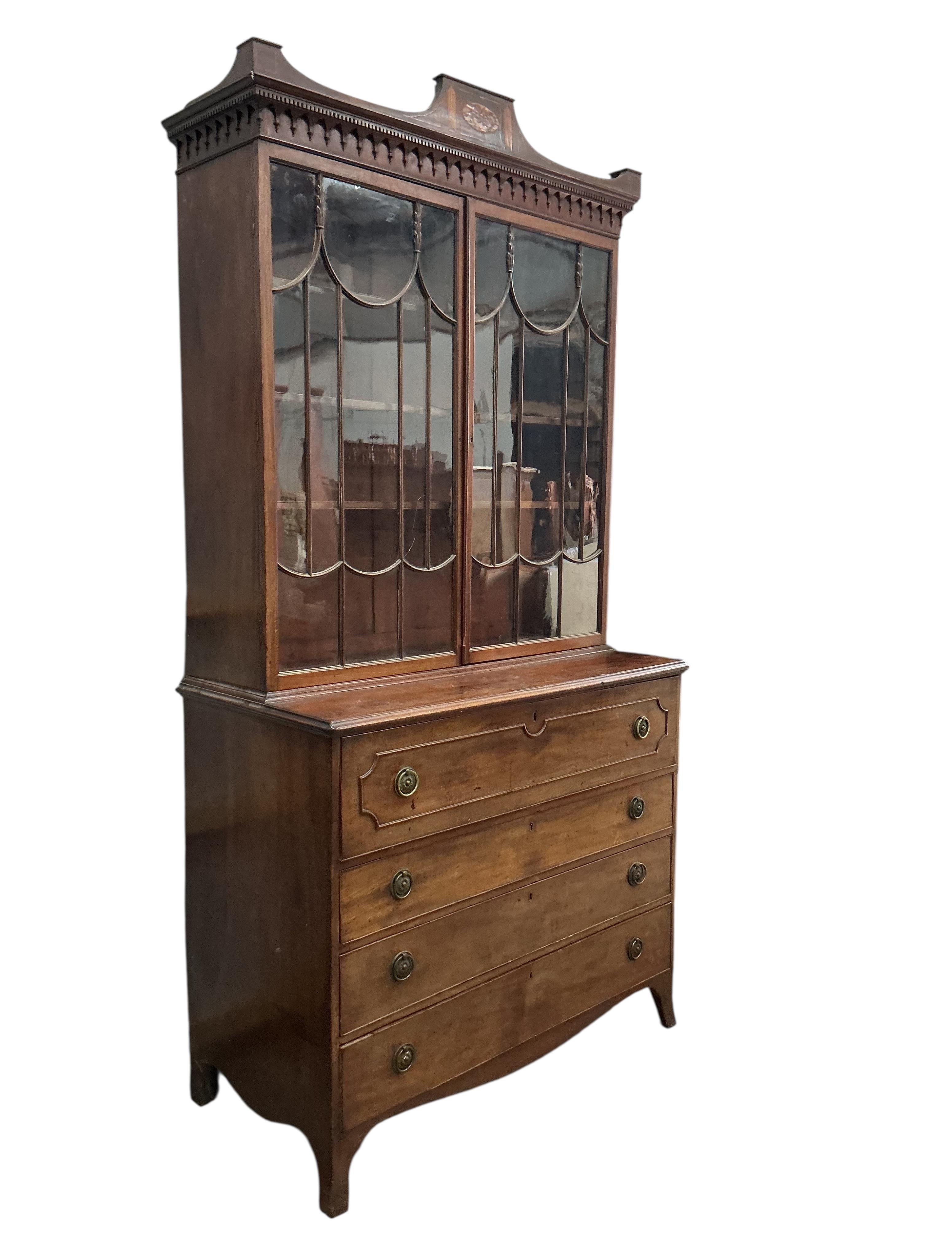 A George III inlaid mahogany secretaire bookcase, width 120cm, depth 60cm, height 238cm